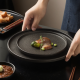 Wholesale Matte Black Pizza Pan Ceramic Flat Steak Plates Europe Style Rimmed Dinner Plate for Restaurant